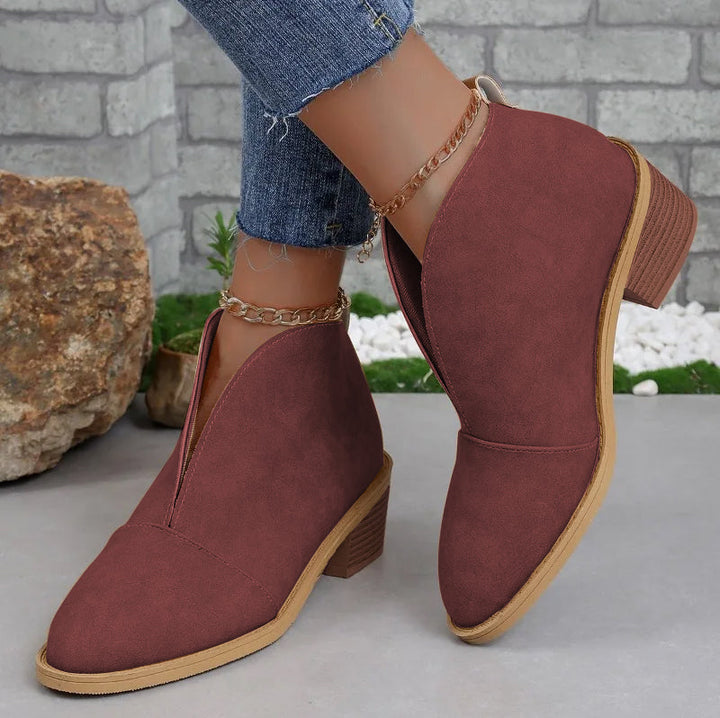 Elegant women's V-cut ankle boots, offering all-day comfort & sophisticated style for any occasion.