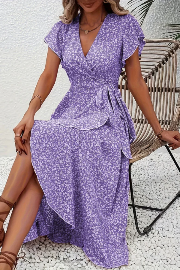 Women's V-neck floral midi dress, embodying spring fashion with a lightweight, comfortable feel.