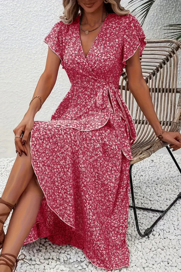 Flattering waistline detail of the elegant women's V-neck floral midi dress, enhancing silhouette.