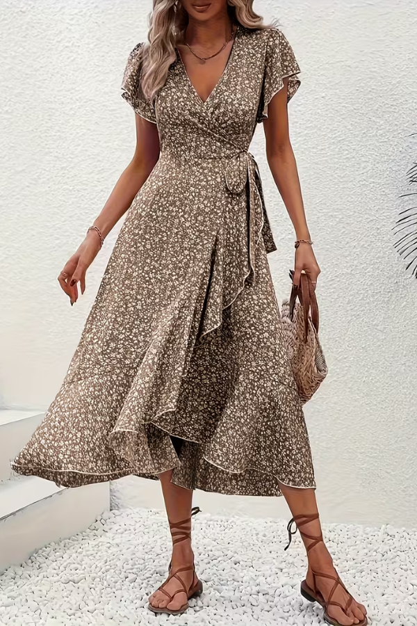 Stylish women's V-neck floral midi dress, detailed back view. Perfect for elegant casual chic.