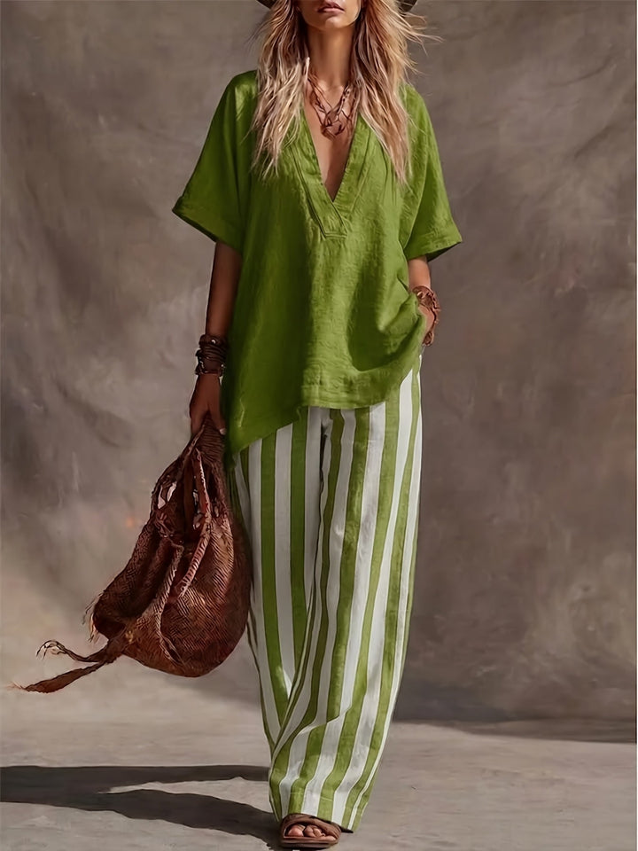 Women's chic V-neck top and striped wide leg pants two-piece set, perfect for summer casual chic.