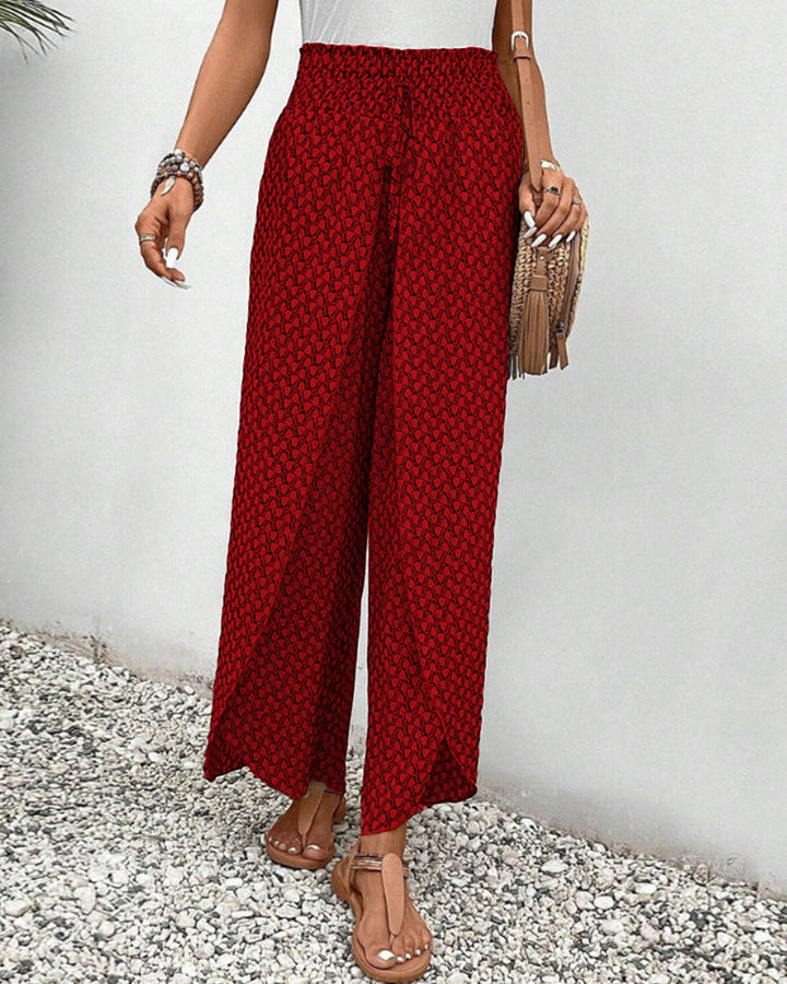Women's geometric print wide leg trousers; relaxed, comfortable fit for all-day wear. Stylish and chic bottom.