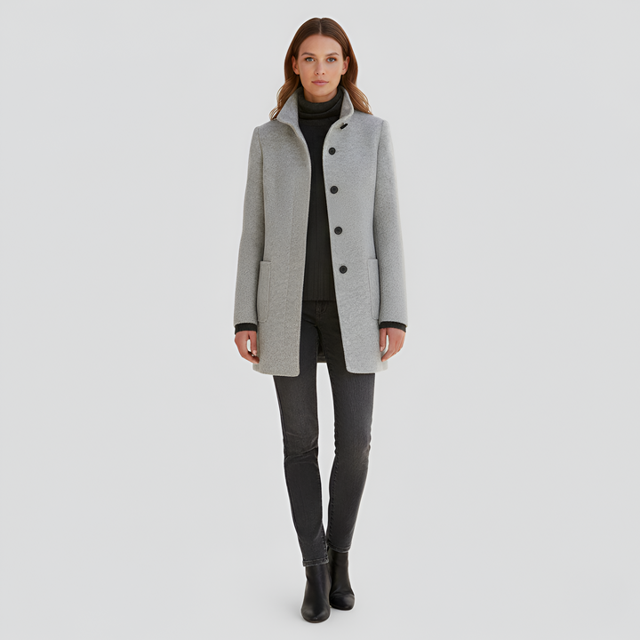 Women's chic winter coat. Elegant long outerwear, warm & stylish for cold weather fashion.