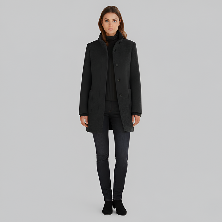 Warm women's long winter coat. Chic and versatile outerwear, ideal for elegant cold weather fashion.