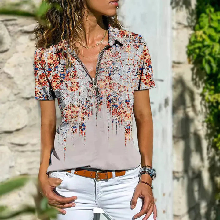 Front view of a ladies' short sleeve summer top with a stylish zip neck and elegant puff sleeves for daily wear.