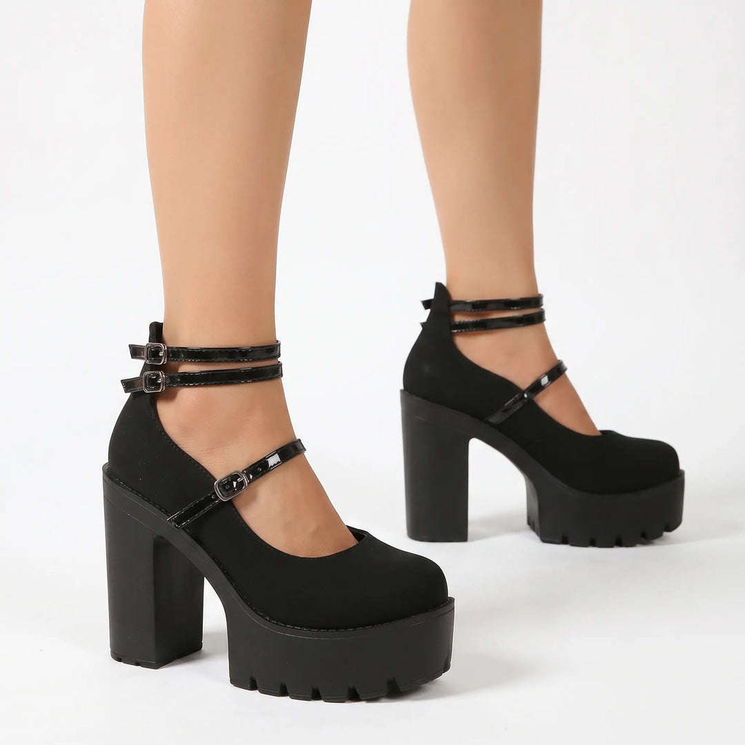 Stylish women's platform pumps with chunky block heel and classic Mary Jane buckle straps for evening or daytime chic.