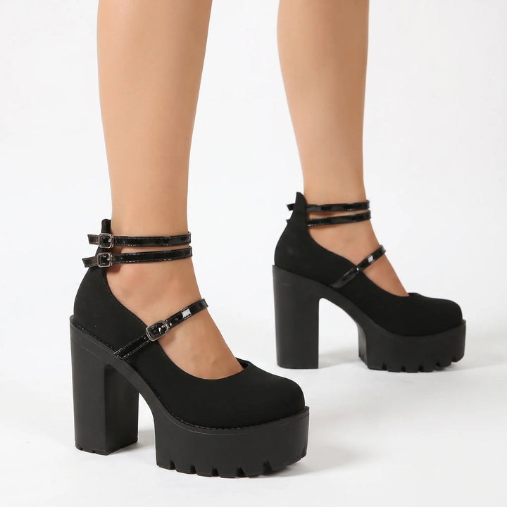 Stylish women's platform pumps with chunky block heel and classic Mary Jane buckle straps for evening or daytime chic.