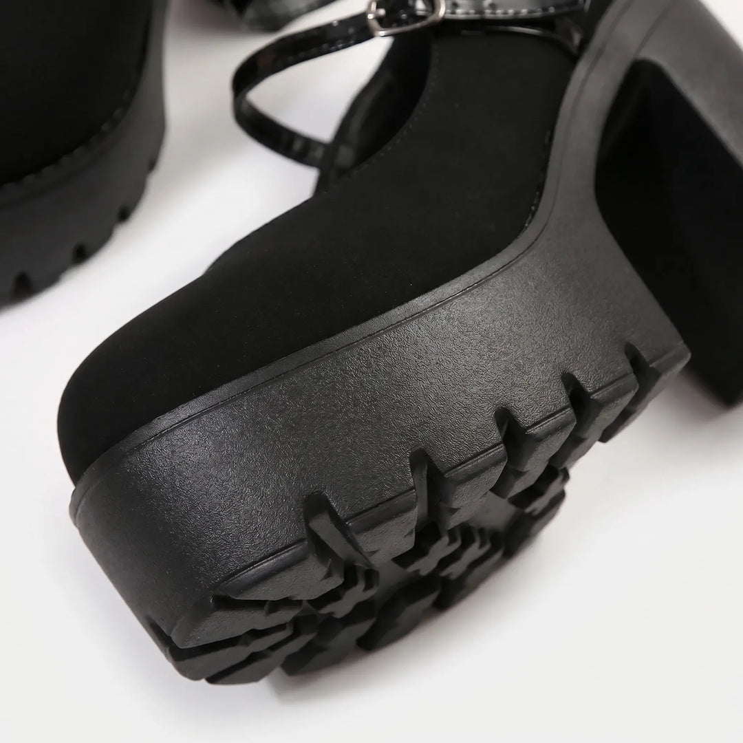 Retro women's Mary Jane platform pumps featuring a bold chunky heel, round toe, and double buckle straps for fashion.