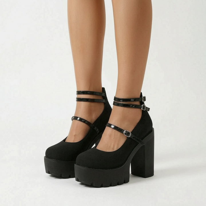 Bold statement women's chunky heel Mary Jane platform pumps with retro design, buckle straps, and a round toe.