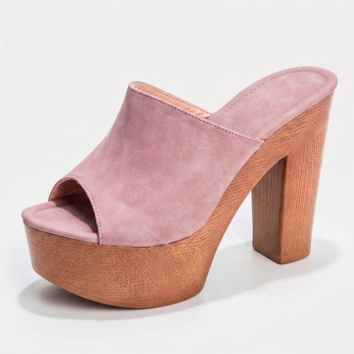 Retro women's slip-on platform sandals with chunky block heel, perfect for casual or dressy summer looks.
