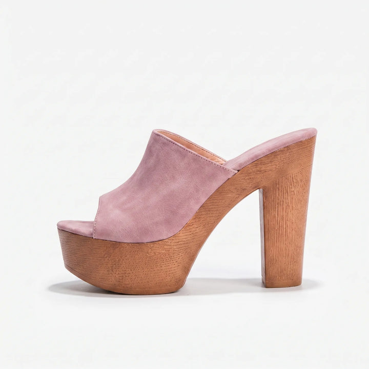 Stylish women's chunky platform sandals featuring a substantial block heel & open toe for summer wear.