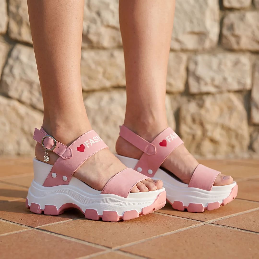 Women's chunky platform sandals with adjustable ankle strap for summer style & comfort.