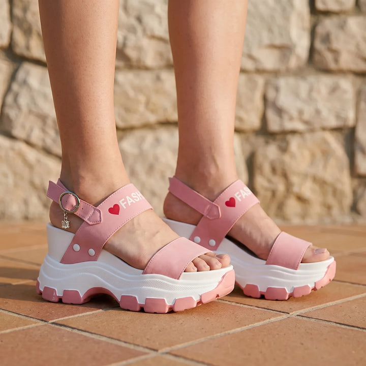 Women's chunky platform sandals with adjustable ankle strap for summer style & comfort.