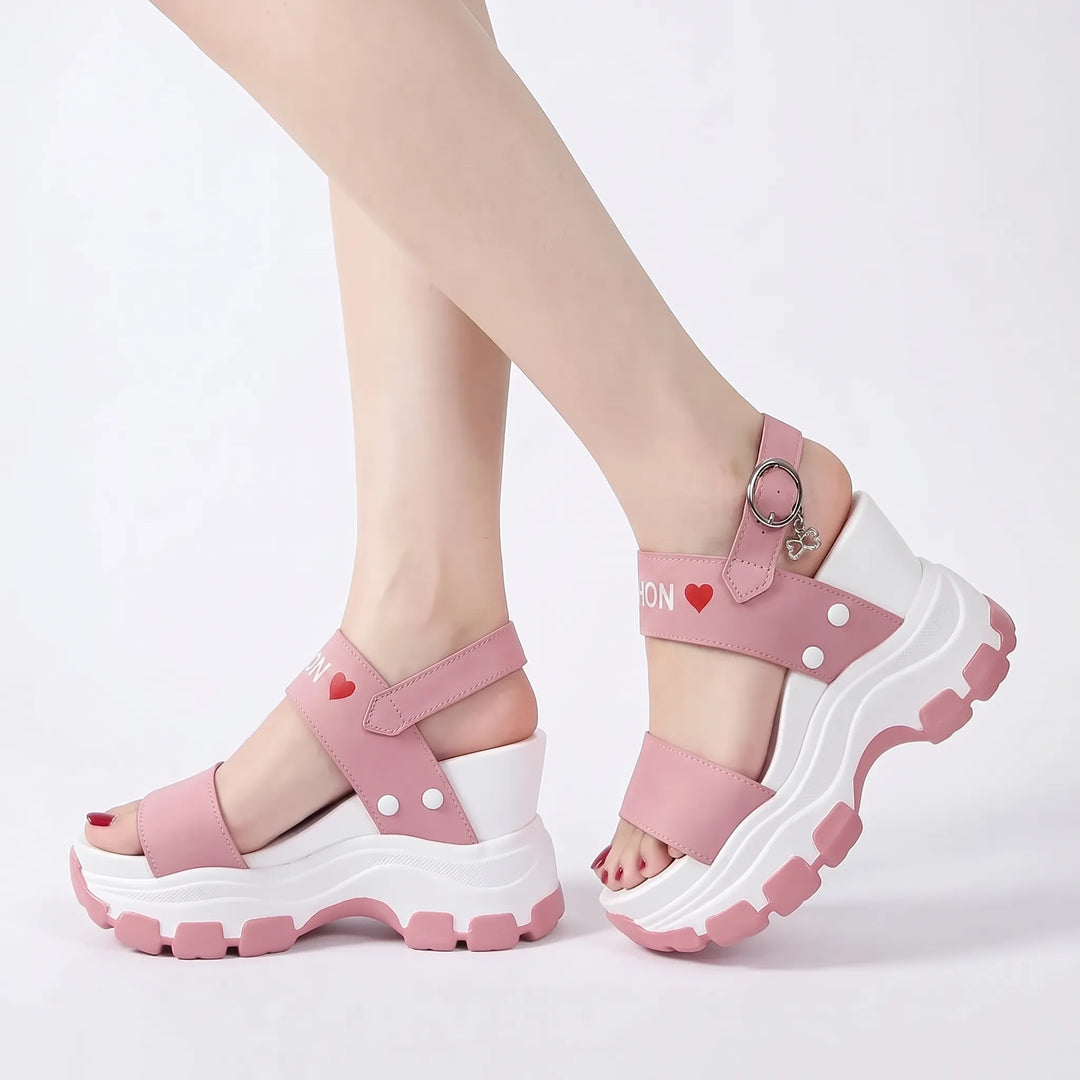 Women's open-toe chunky platform sandals with a supportive adjustable ankle strap for comfort.