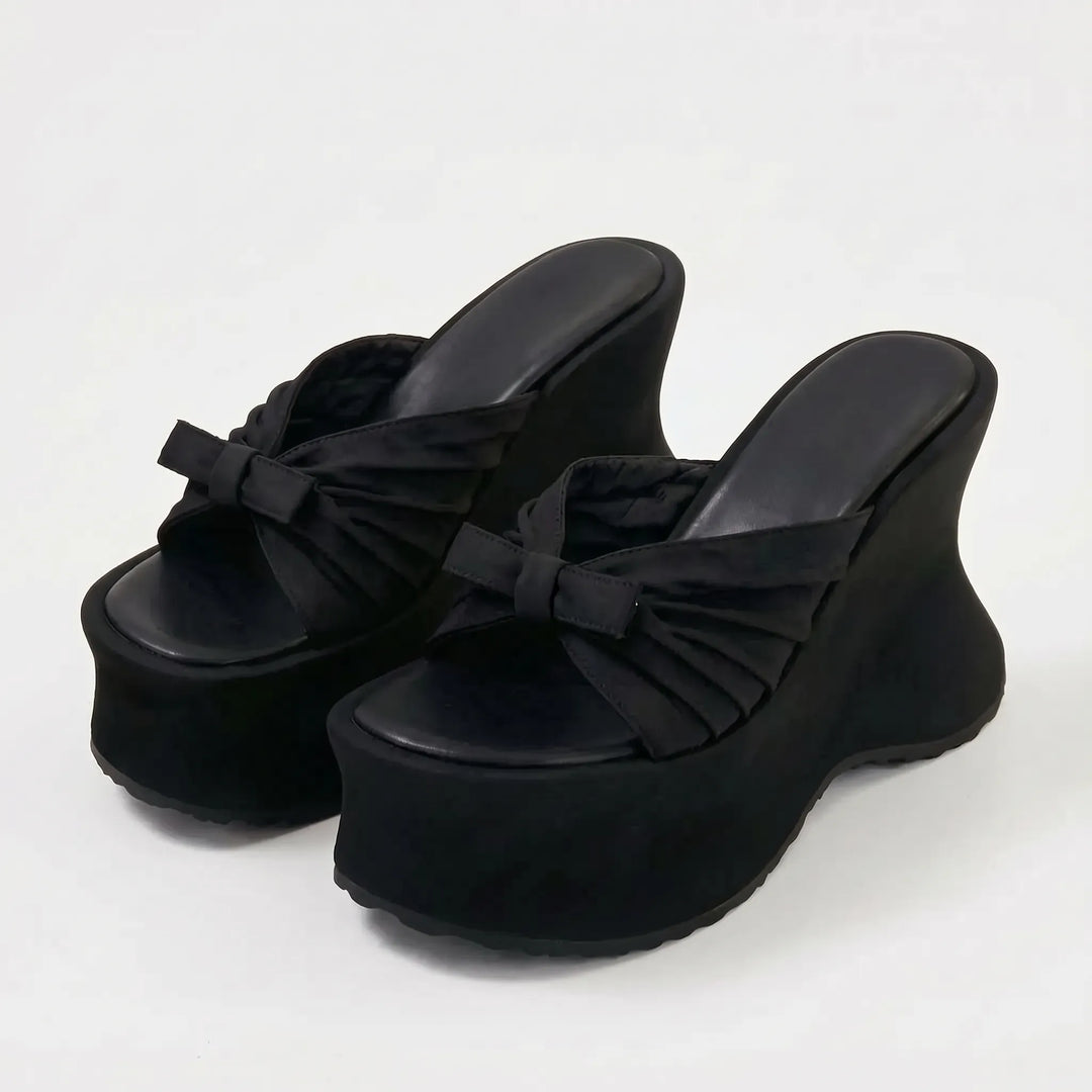 Elegant women's platform wedge sandals. Chunky high heel footwear for an elevated look, perfect for evenings.