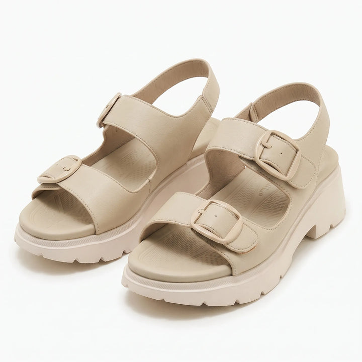 Trendy women's chunky platform wedge sandals. Modern open-toe design, essential chic summer footwear.