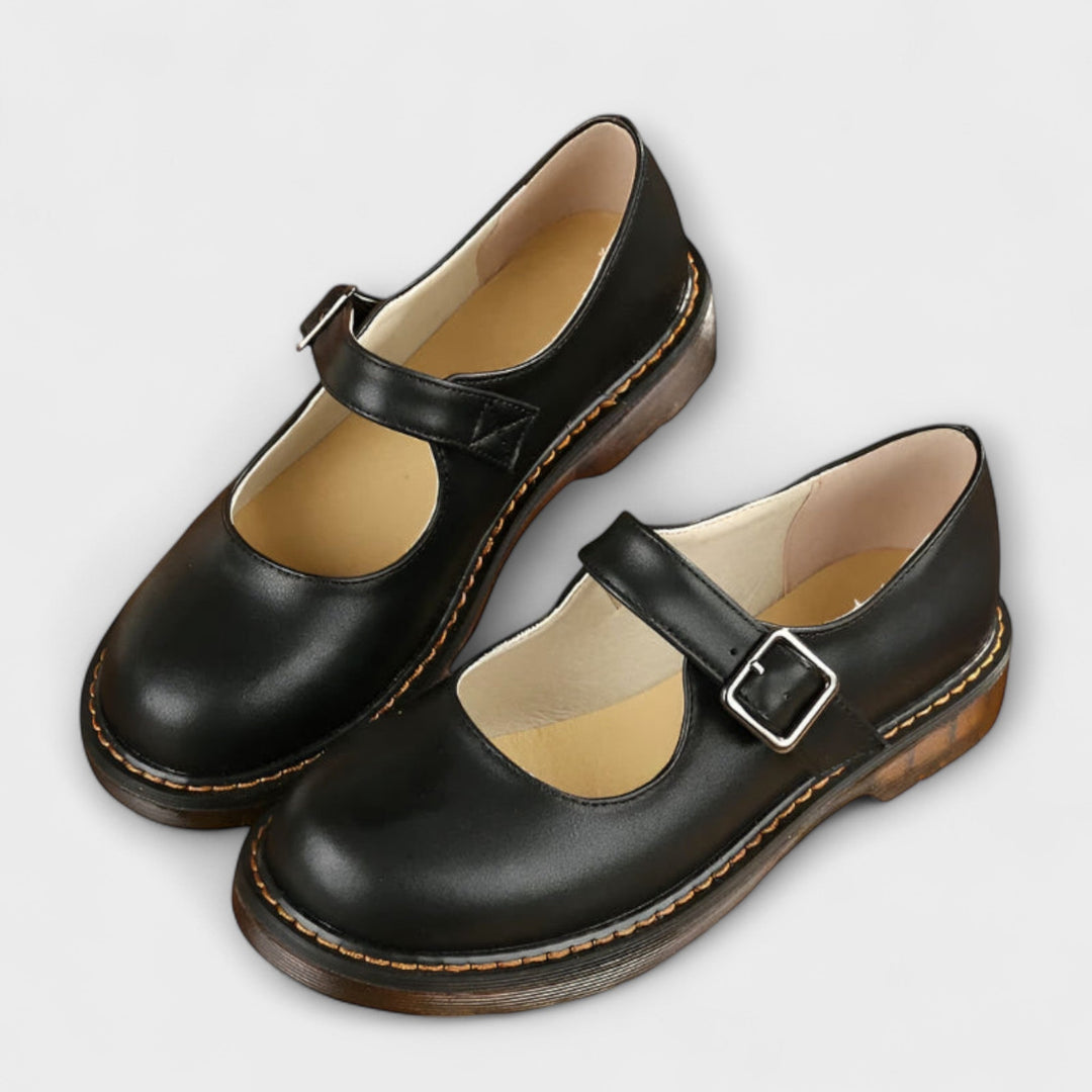 Women's Mary Jane flats with chunky sole, buckle strap, and round toe. Stylish retro everyday footwear.