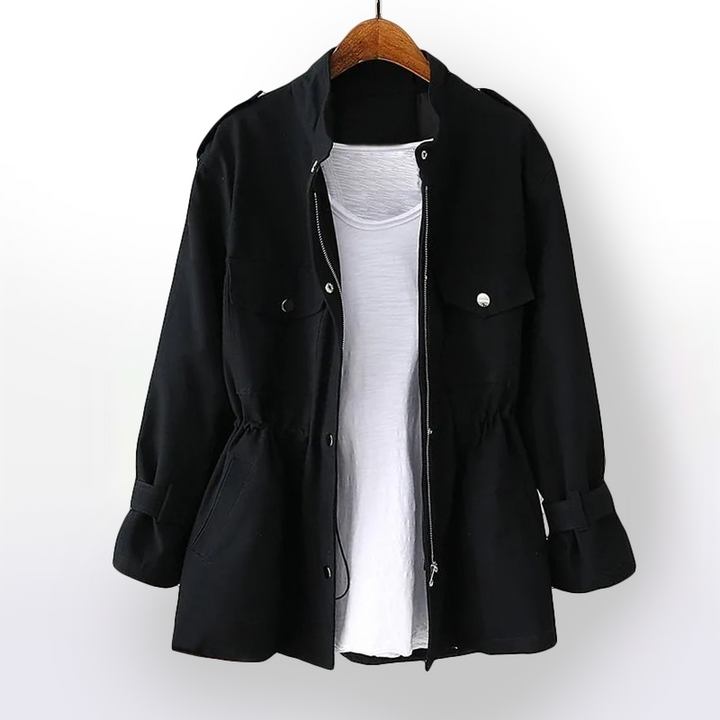 Fashionable women's belted trench coat featuring a sharp notch collar. A classic, sophisticated outerwear choice.