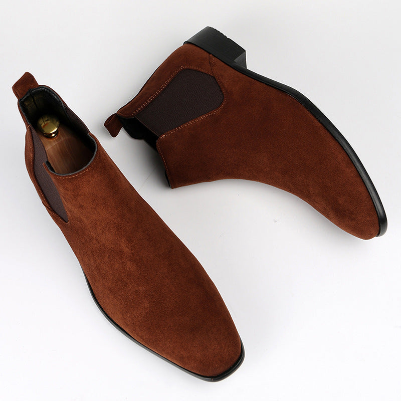 Women's classic black Chelsea boots with block heel & elastic side panels, perfect for versatile casual and office wear.