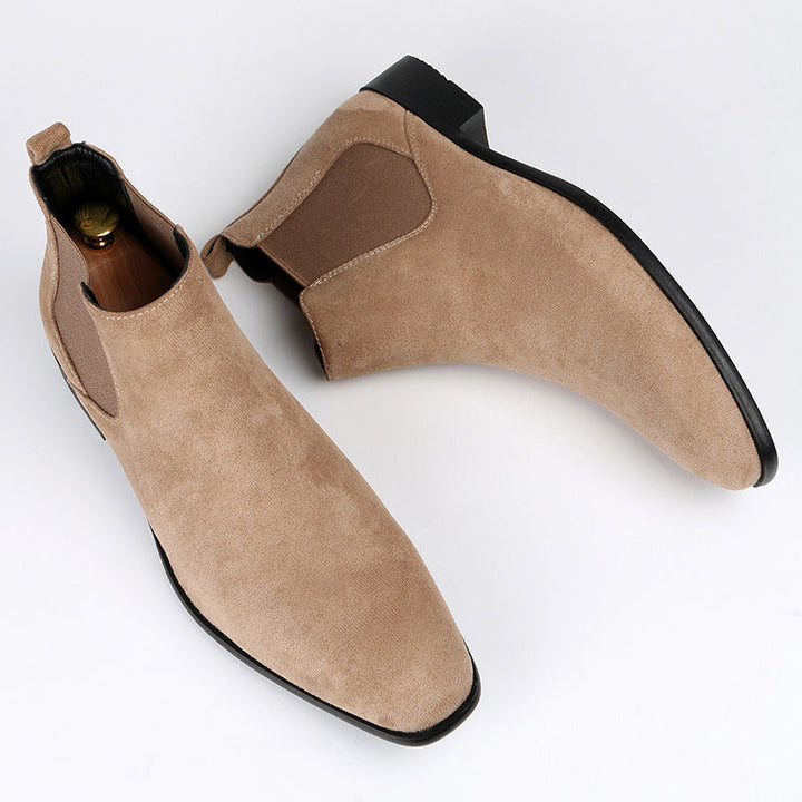 Chic women's slip-on Chelsea boots showcasing a stylish block heel, an excellent addition to any women's fashion collection.