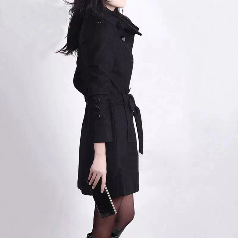 Elegant women's belted trench coat with double-breasted design, ideal for autumn & winter outerwear.