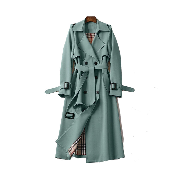 Classic women's double-breasted trench coat, a stylish fall jacket perfect for an elegant look.