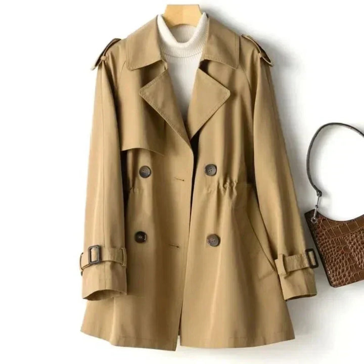 Stylish women's belted double-breasted trench coat. Perfect long jacket for office wear & versatile outerwear.