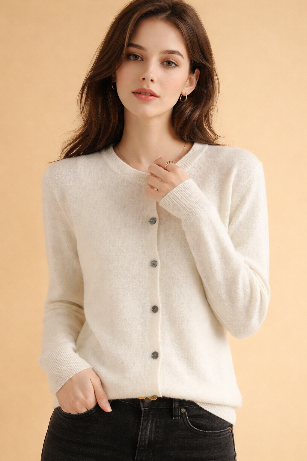 Professional women's round neck knit cardigan for office attire. Button-front, long sleeve, a versatile layering piece.