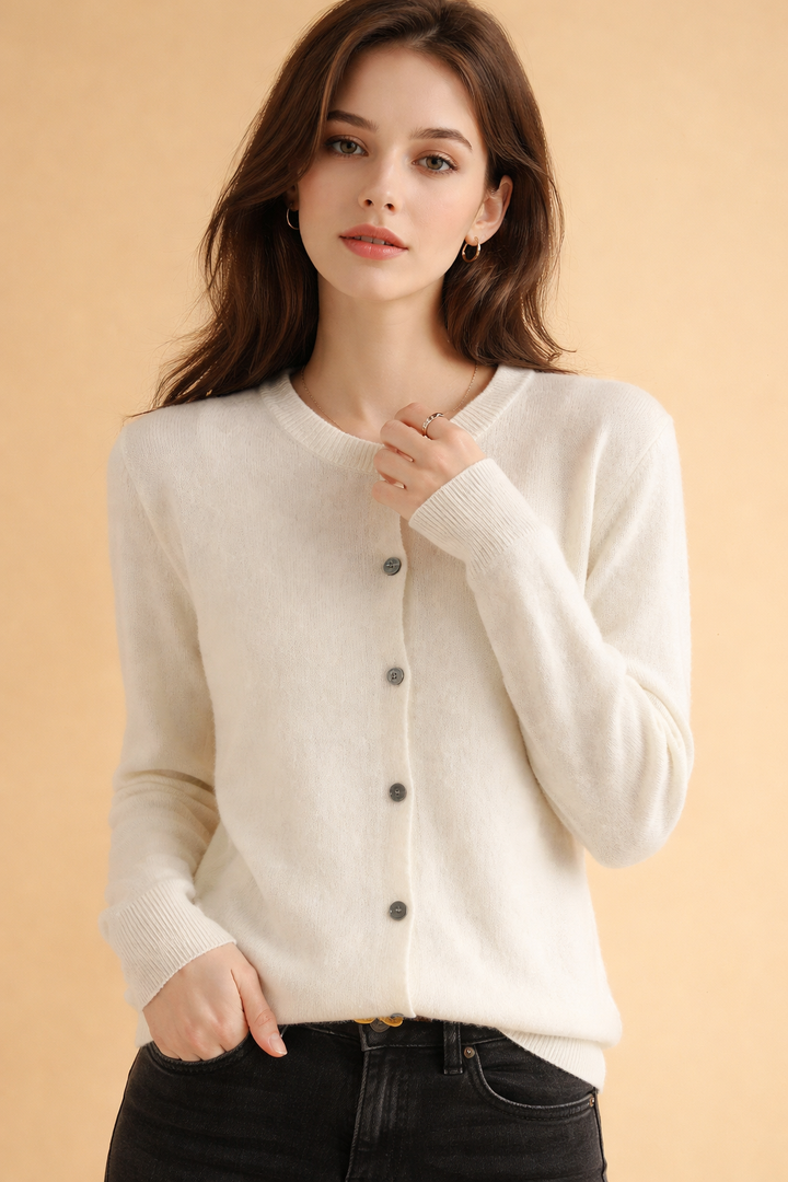 Professional women's round neck knit cardigan for office attire. Button-front, long sleeve, a versatile layering piece.
