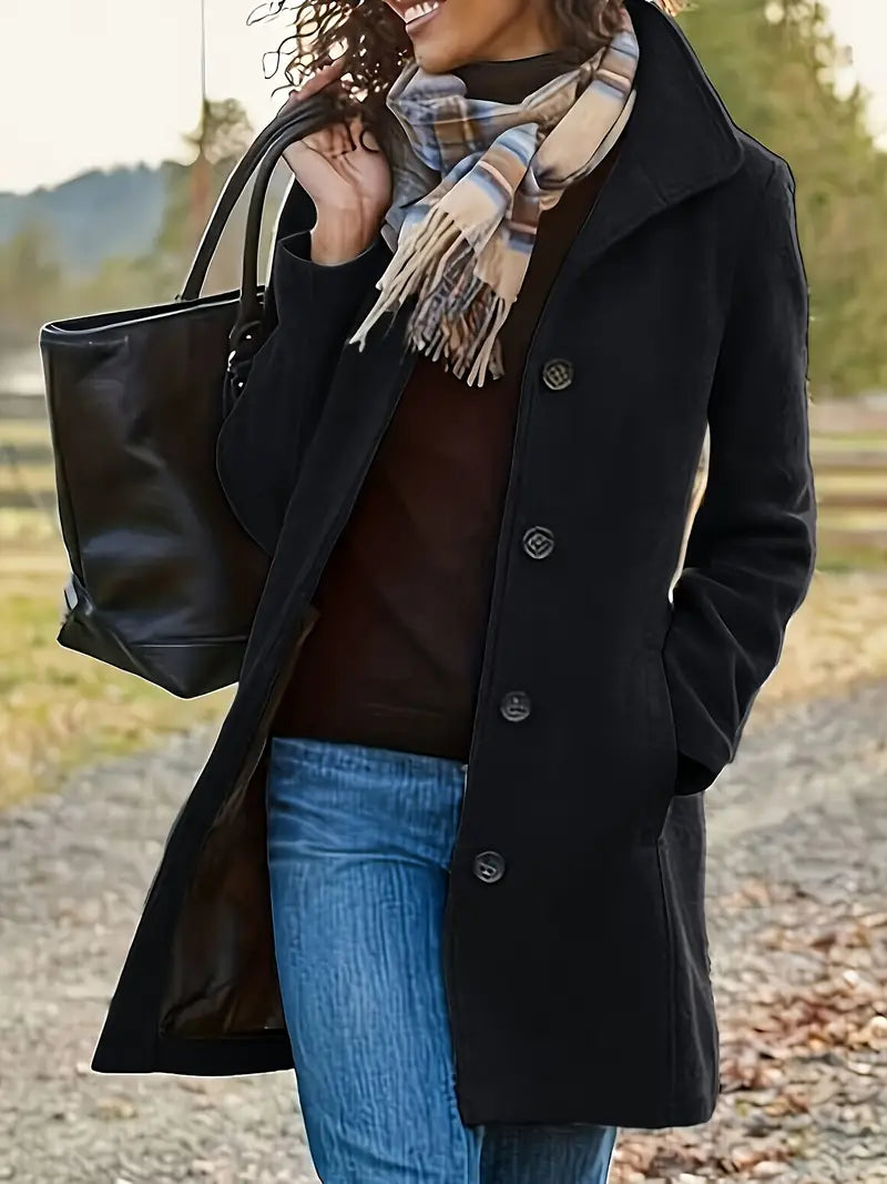 Women's classic trench coat. Button-front, lapel collar, elegant mid-length design for fall and winter fashion.