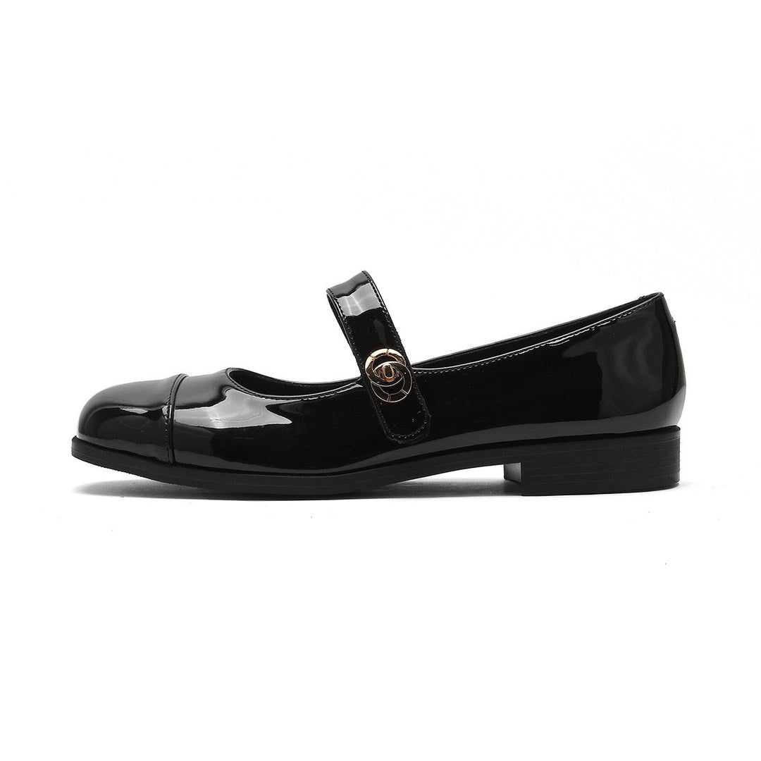 Elegant women's patent Mary Jane flats, combining a wide toe box with targeted arch support.