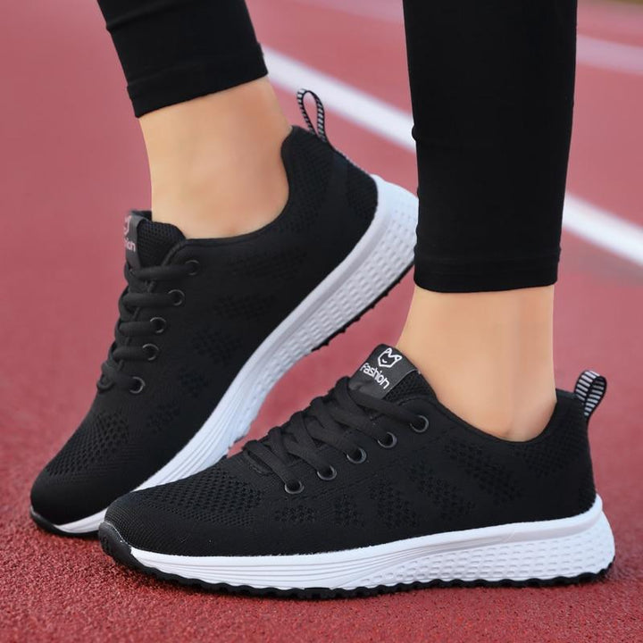 Stylish women's orthopedic shoes, grey, with breathable upper for active comfort.