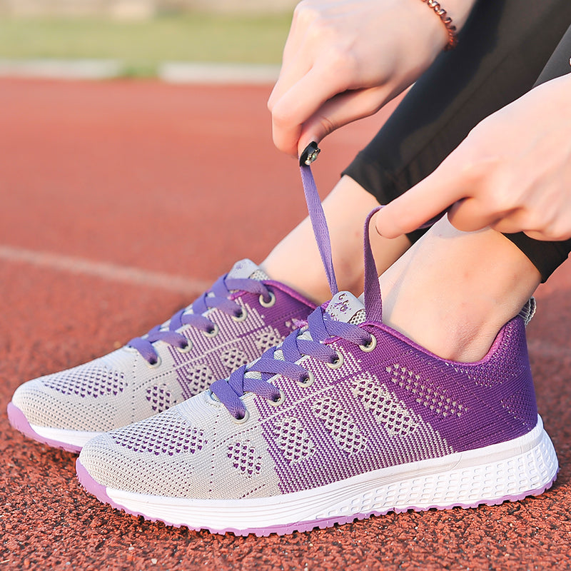 Breathable mesh women's walking shoes with arch support, ideal for active lifestyle.