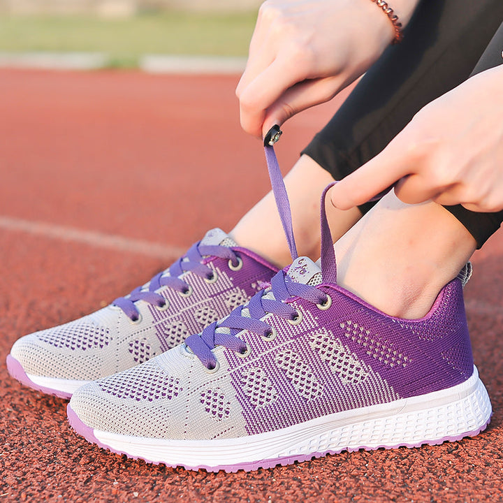 Breathable mesh women's walking shoes with arch support, ideal for active lifestyle.