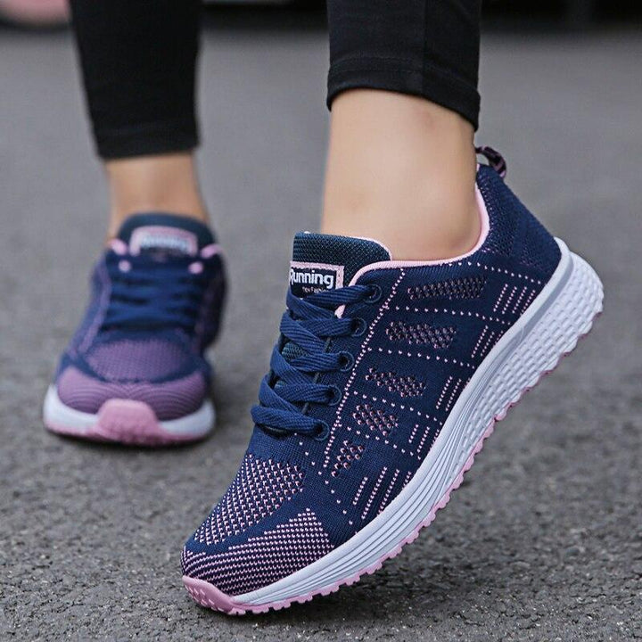 Women's active lifestyle shoes, grey, with orthopedic features and breathable design.