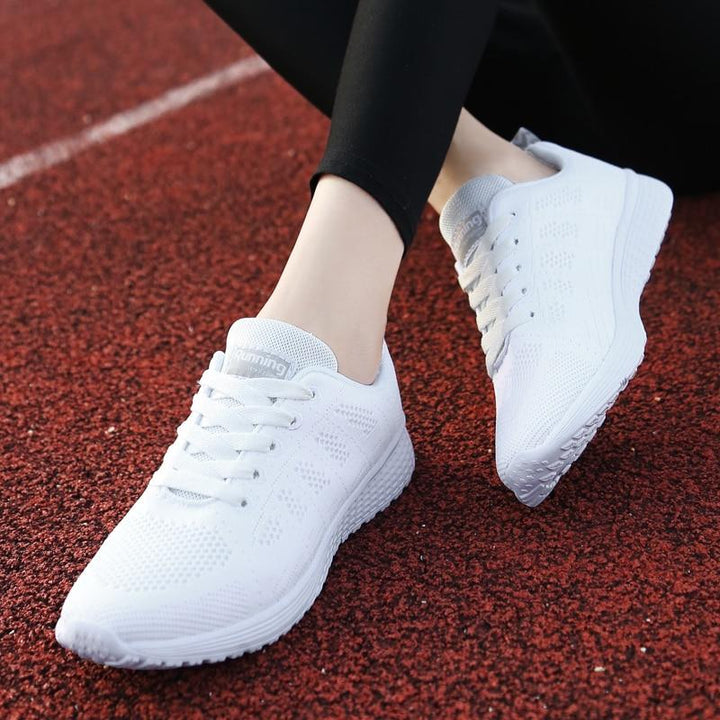 Breathable women's walking shoes, black, with superior comfort for active lifestyle.