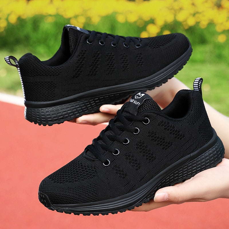 Comfortable women's shoes for walking, white, featuring arch support technology.