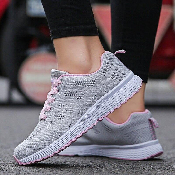 Lightweight women's walking shoes with arch support, perfect for everyday comfort.