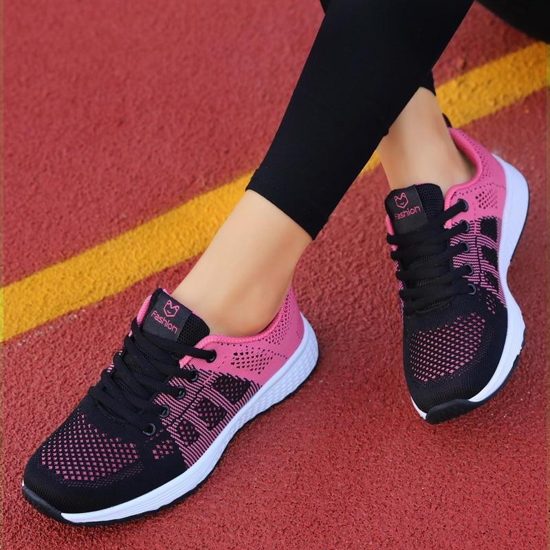 Foot support women's shoes, pink, with comfortable design for walking & everyday wear.