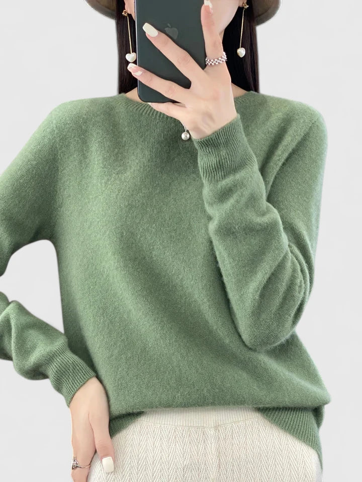 Layered women's classic round neck sweater outfit, cozy and comfortable knitwear.