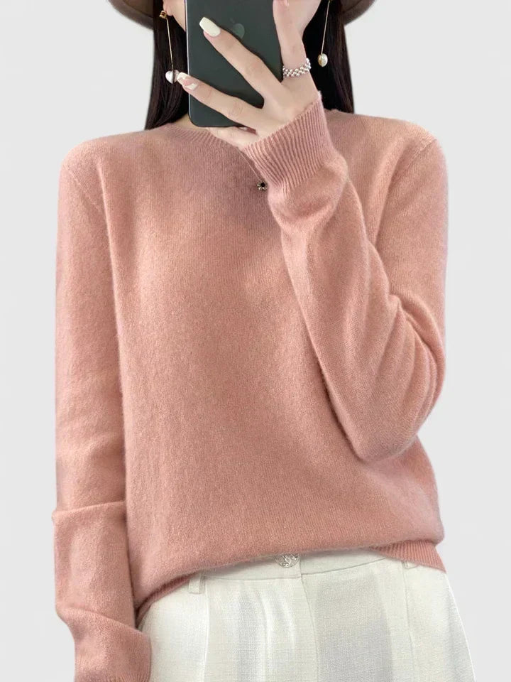 Versatile women's long sleeve knit pullover, classic round neck, fall & winter wear.