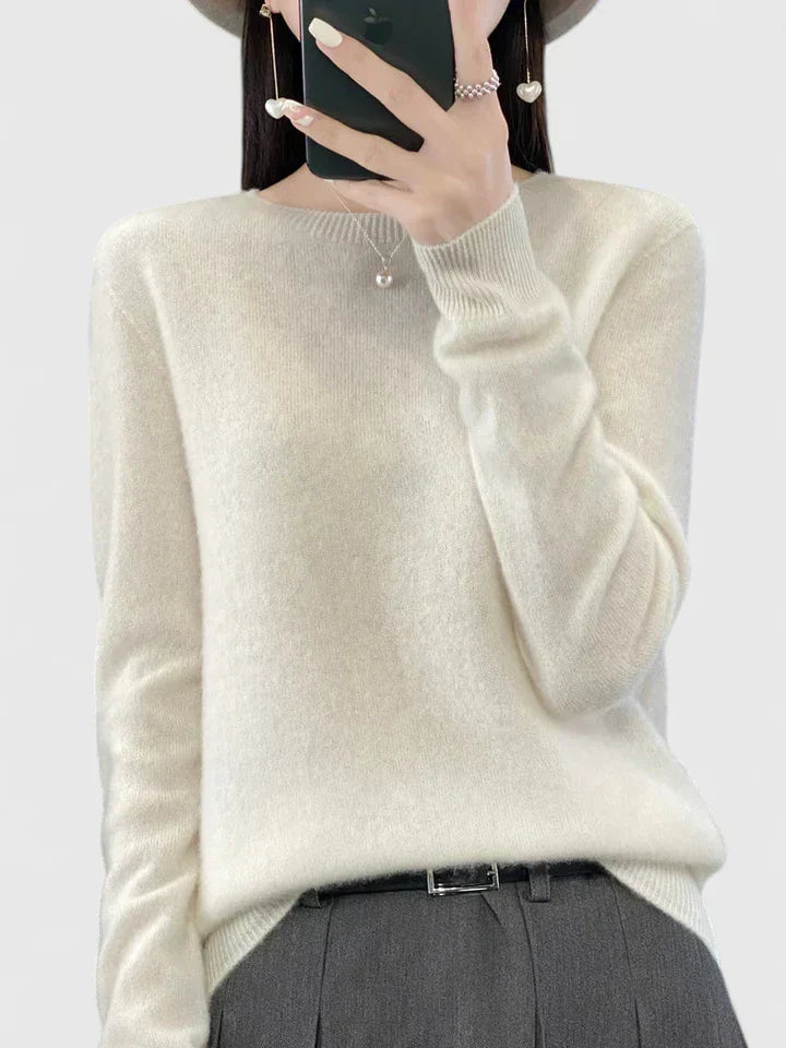 Classic knitwear women's round neck pullover sweater, stylish long sleeve comfort.