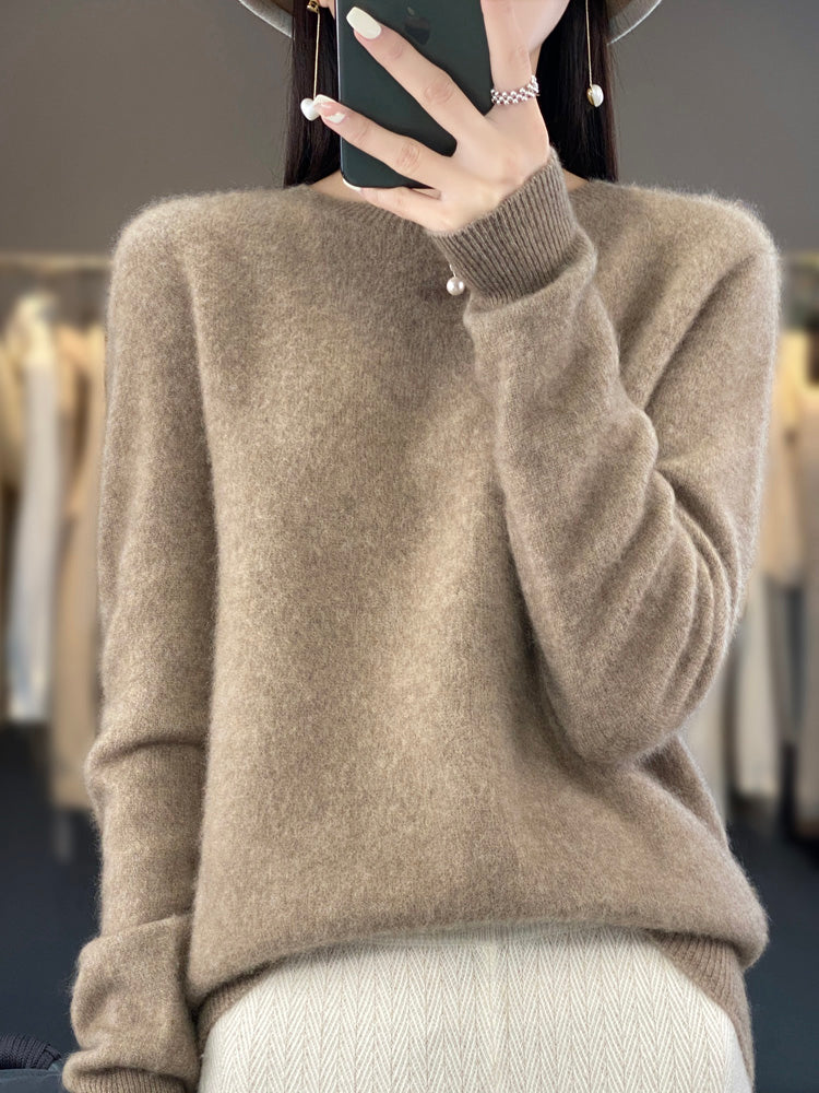 Navy blue women's round neck pullover sweater, comfortable and stylish for everyday.