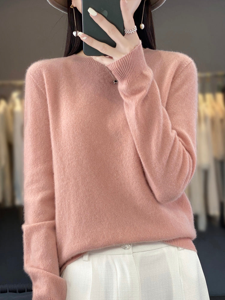Cozy knit women's round neck pullover sweater for fall fashion and warmth.