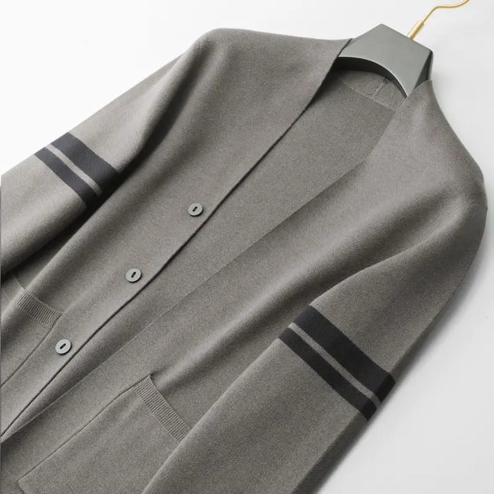 Stylish women's striped cardigan, a fall fashion essential & versatile winter layering piece for comfort.