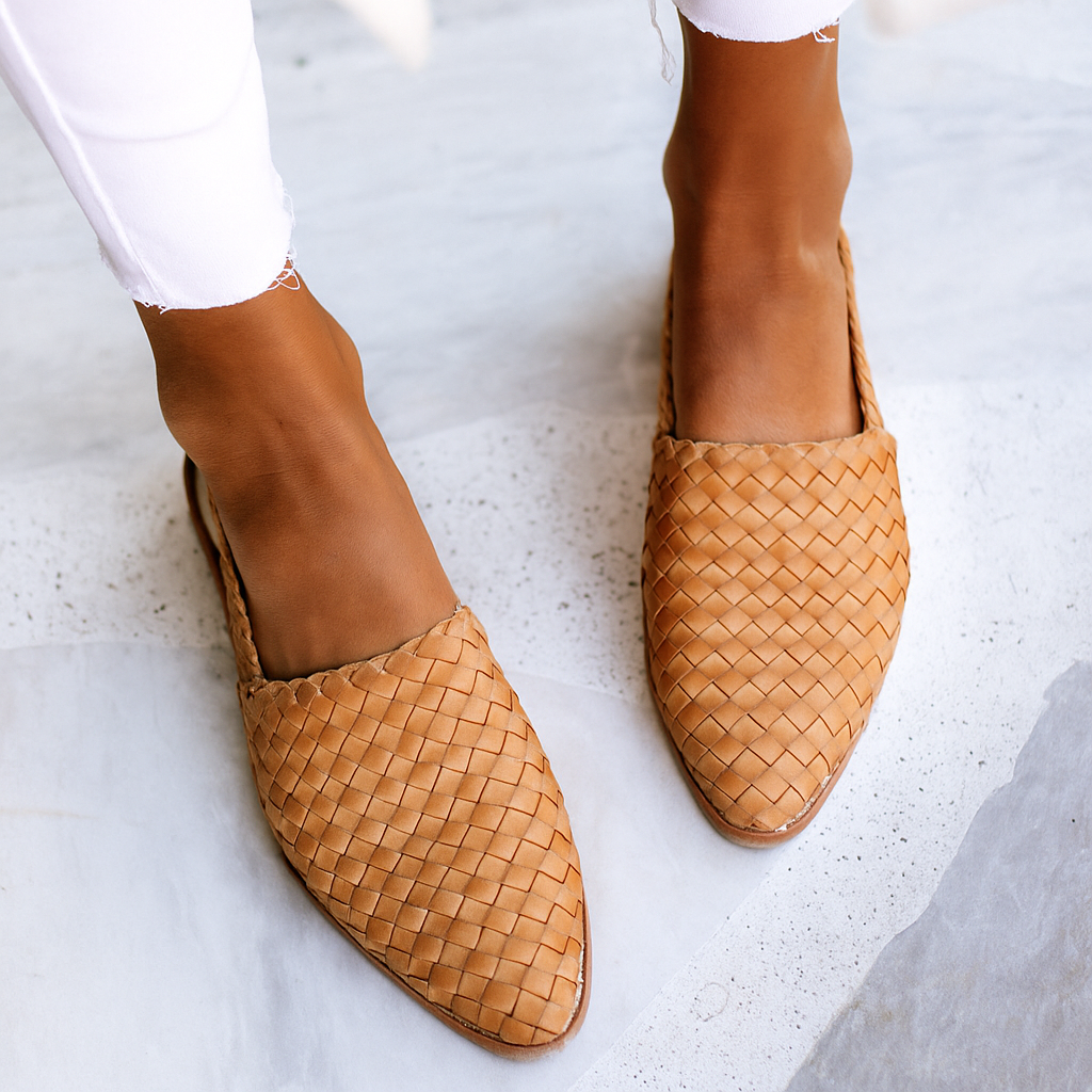 Women's closed-toe slip-on mules, flat design for everyday comfort & casual chic style.