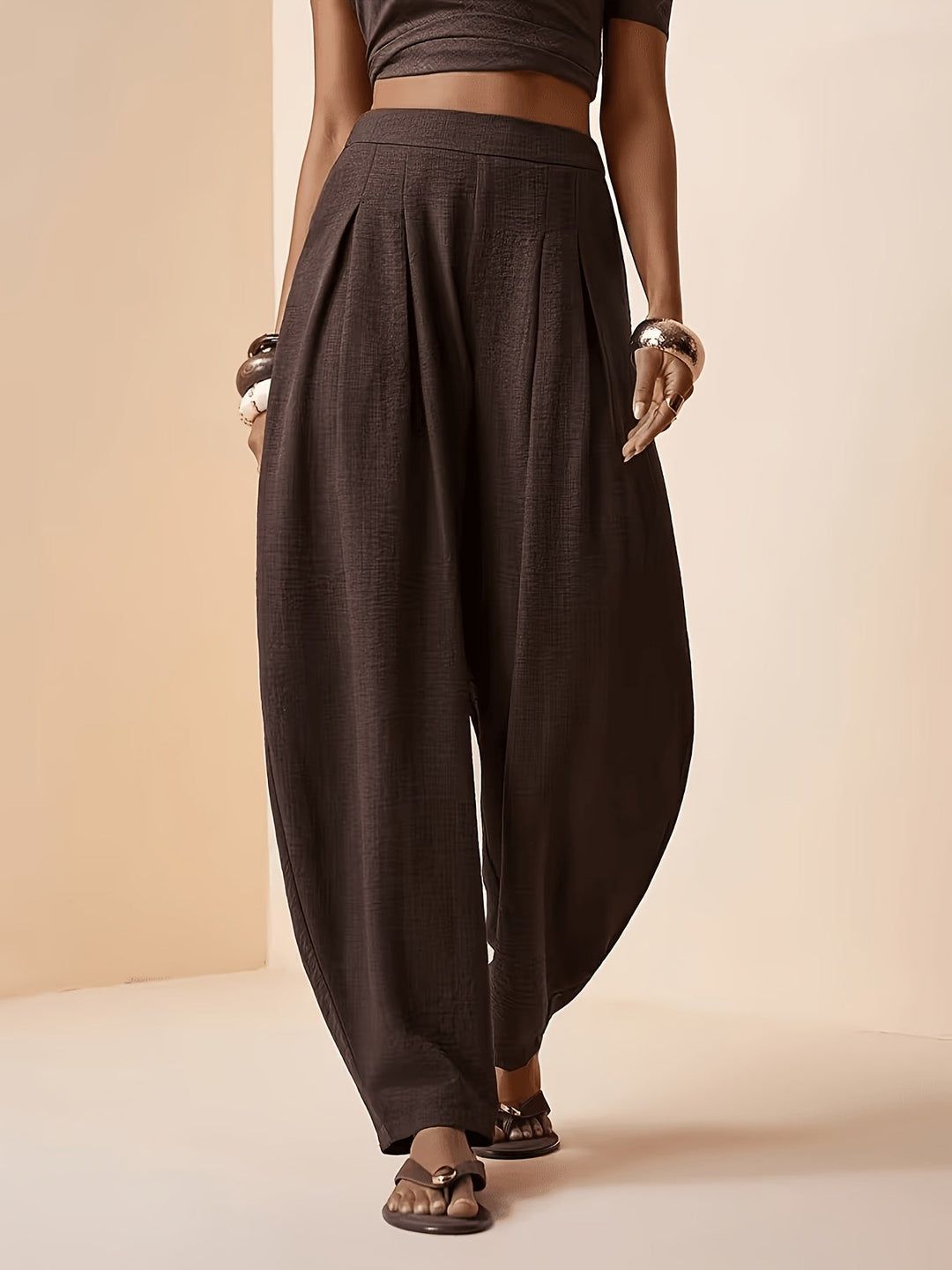 Women's coffee brown harem pants with a relaxed fit, high waist, and tapered ankle for comfortable casual wear.