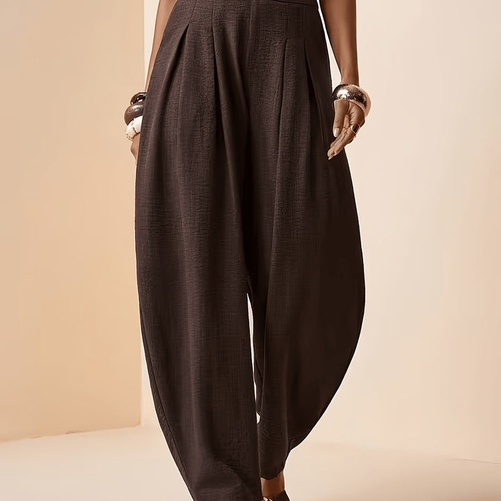 Comfortable women's coffee brown harem pants featuring a relaxed fit, high waist, and tapered ankle for versatility.