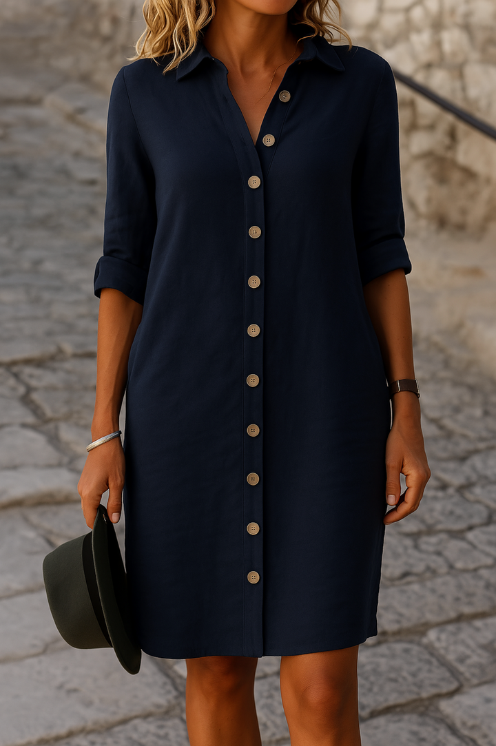 Women's summer casual dress, knee-length, button front, collared, roll-tab sleeves for a relaxed look.