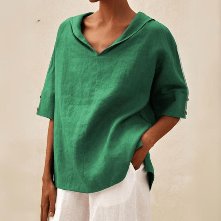 Women's collared v-neck tunic top, relaxed fit for effortless casual wear. Versatile long shirt for everyday style.
